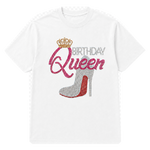 A white short-sleeve t-shirt with a rhinestone-style graphic on the front that reads 'BIRTHDAY Queen' with a crown and a high-heeled shoe in pink, silver, and red tones.