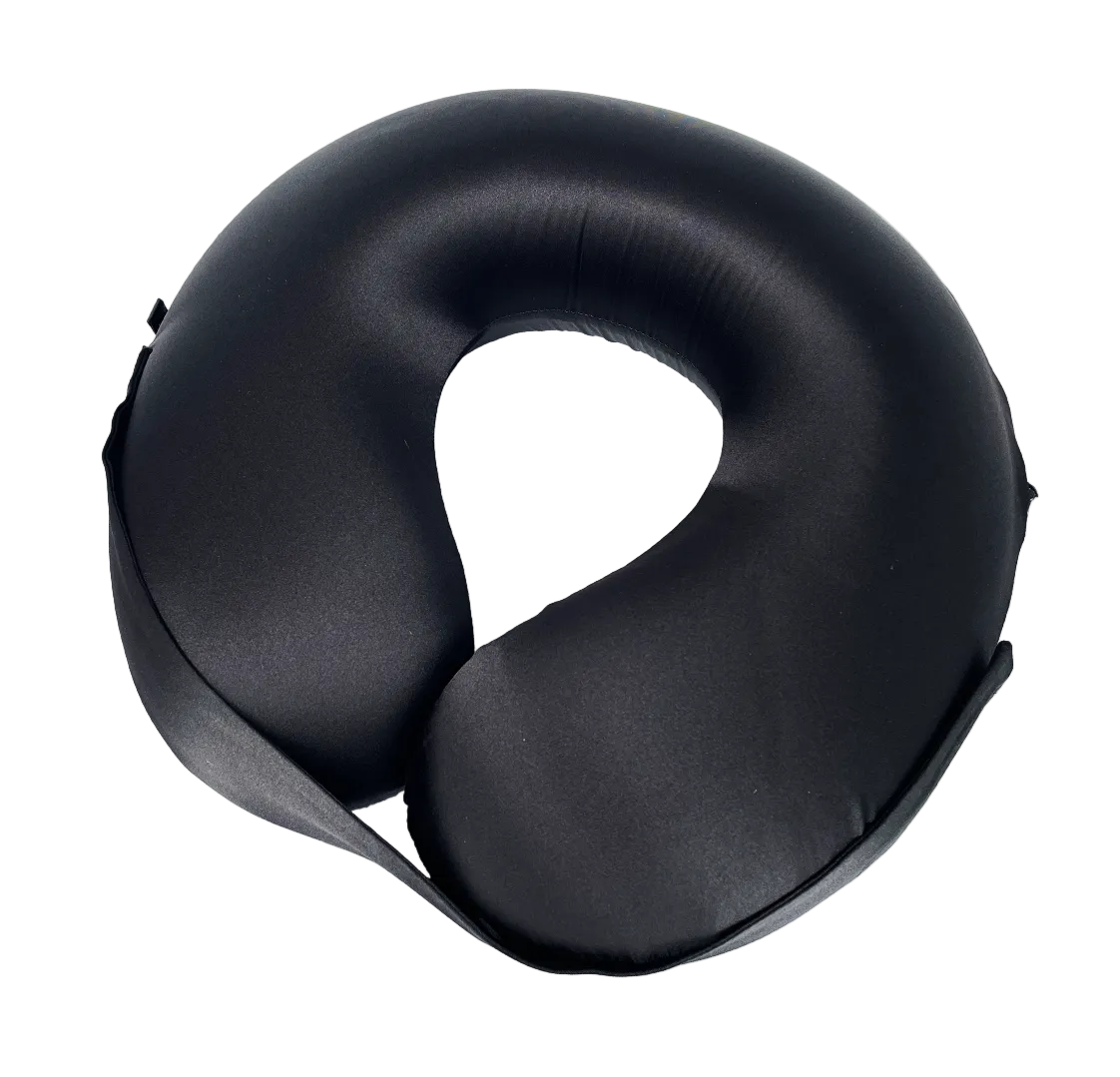 Black U-Shaped Memory Foam Travel Neck Pillow with Velcro strap on a white background