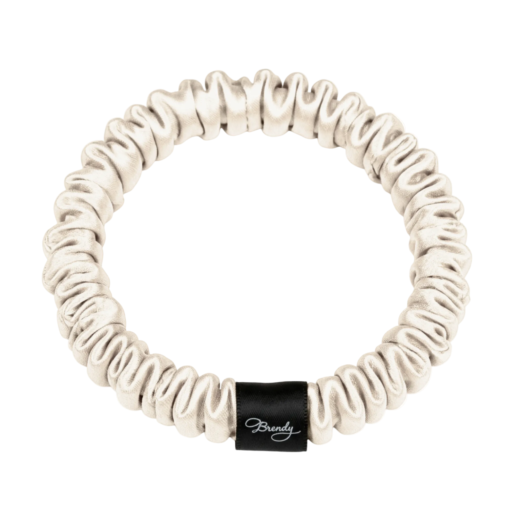 Blonde skinny silk scrunchie with a black Brindy Label on a white background