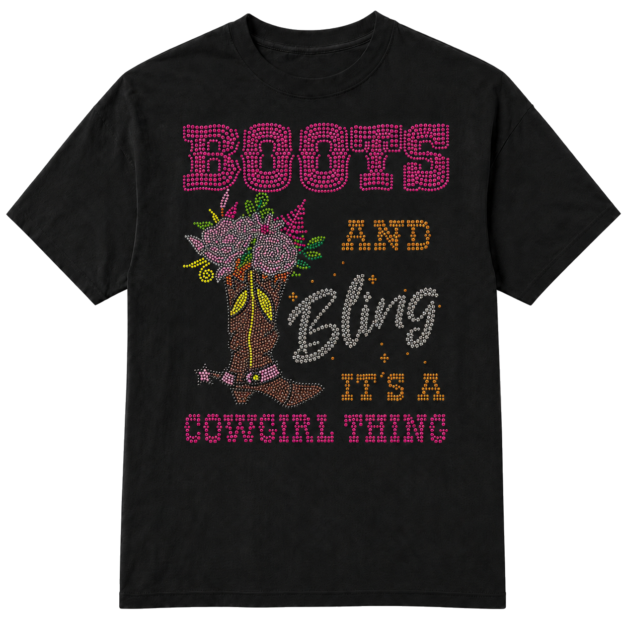 A black short-sleeve t-shirt with a western-themed rhinestone-style graphic that reads 'BOOTS AND Bling IT'S A COWGIRL THING' in pink, gold, and silver lettering, alongside an illustration of a cowboy boot decorated with flowers on a transparent background.