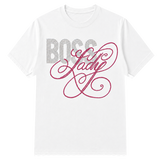 A white short-sleeve crewneck t-shirt featuring a rhinestone-style graphic on the chest with the word 'BOSS' in silver block letters and 'Lady' in pink cursive script on a tgransparent background