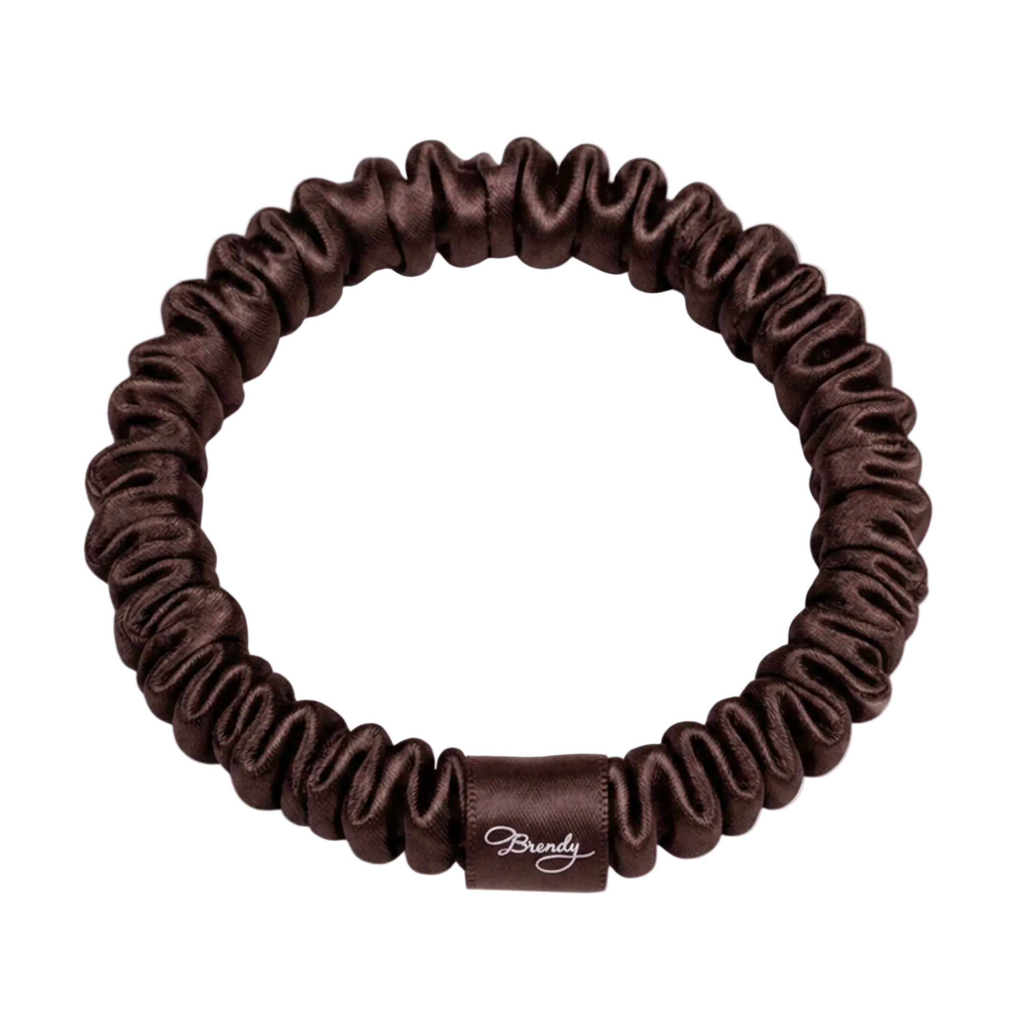 Brunette skinny silk scrunchie with a black Brindy Label on a white 