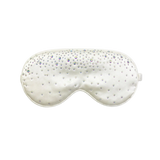 Champagne silk sleep/ eye mask with small rhinestone embellishments on a white background