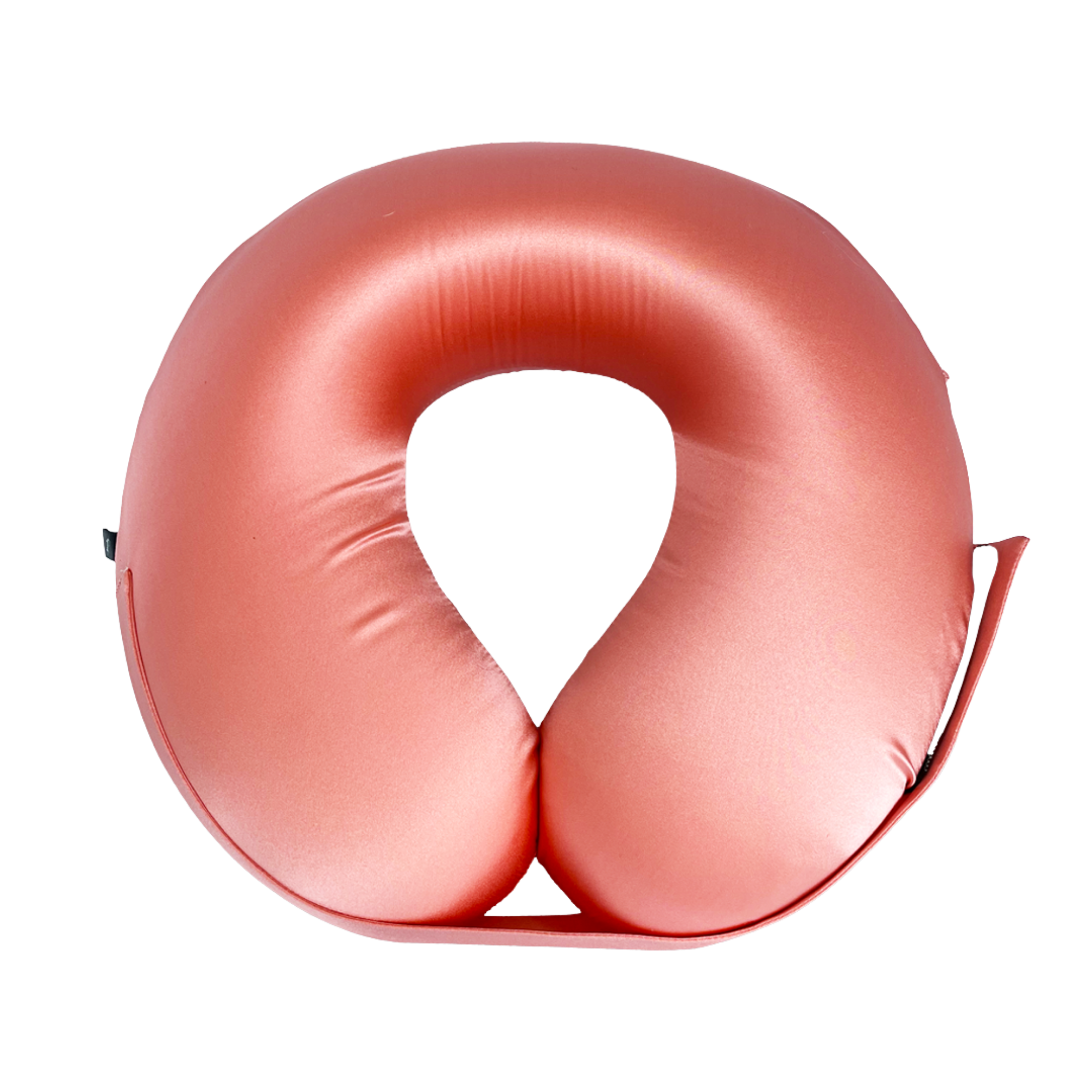 A U-shaped inflatable travel neck pillow in a coral, shown against a solid white background.