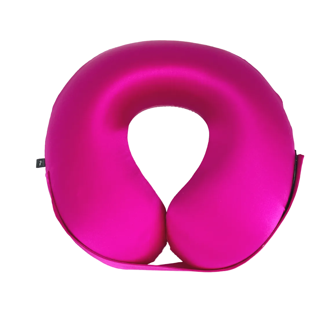 Fuchsia Pink U-Shaped Memory Foam Travel Neck Pillow with Velcro strap on a white background