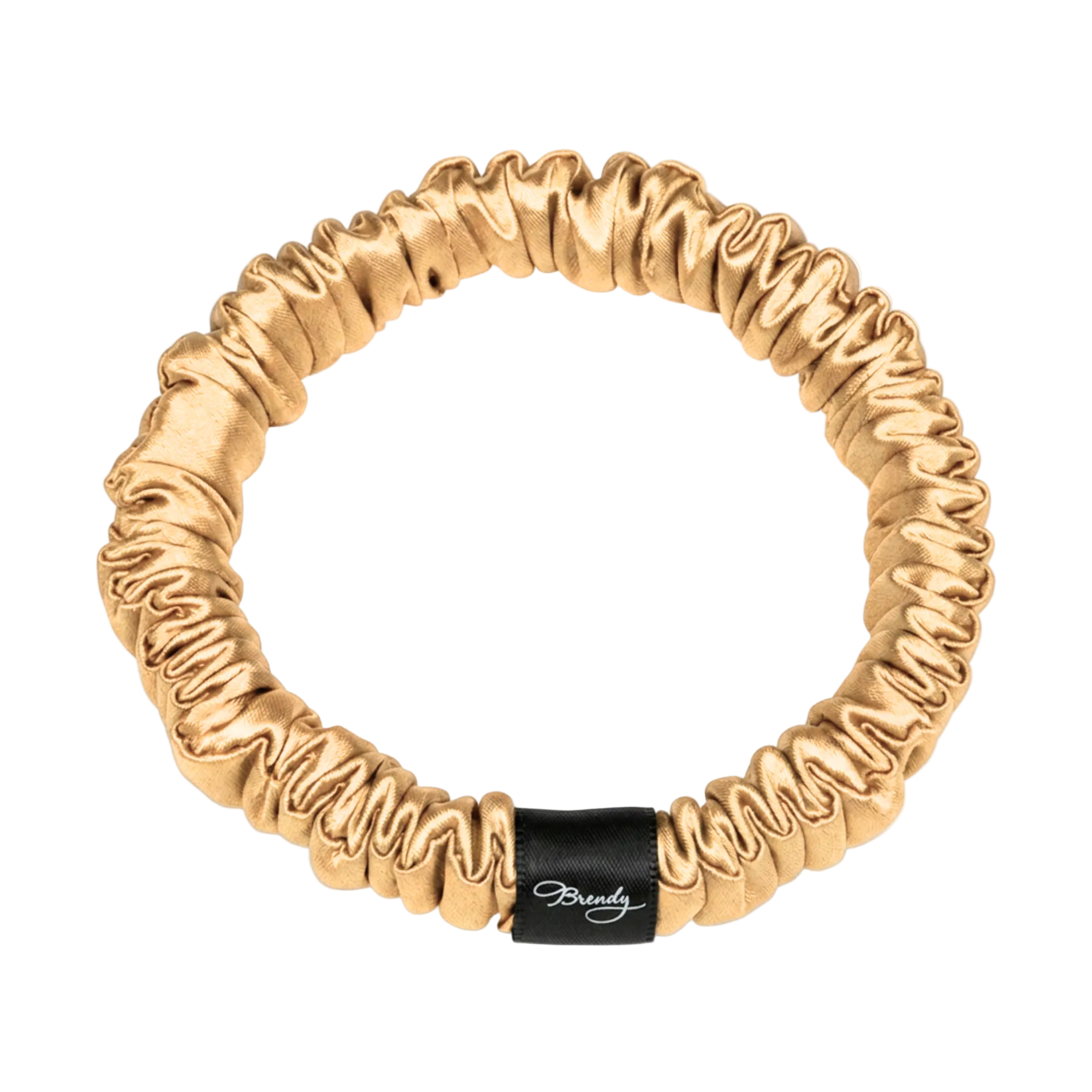 Gold skinny silk scrunchie with a black Brindy Label on a white background
