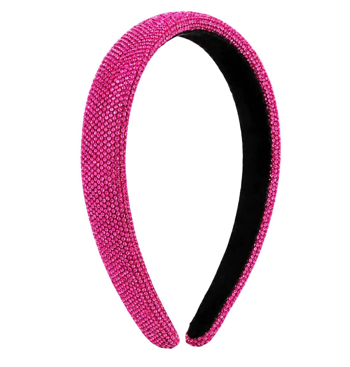 A wide, padded headband covered in sparkling hot pink rhinestones, with a black fabric lining visible on the inner side, shown on a white and gray checkered background.