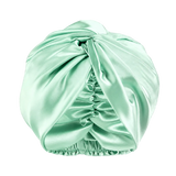 Silk turban style bonnet in a mint color on a white background