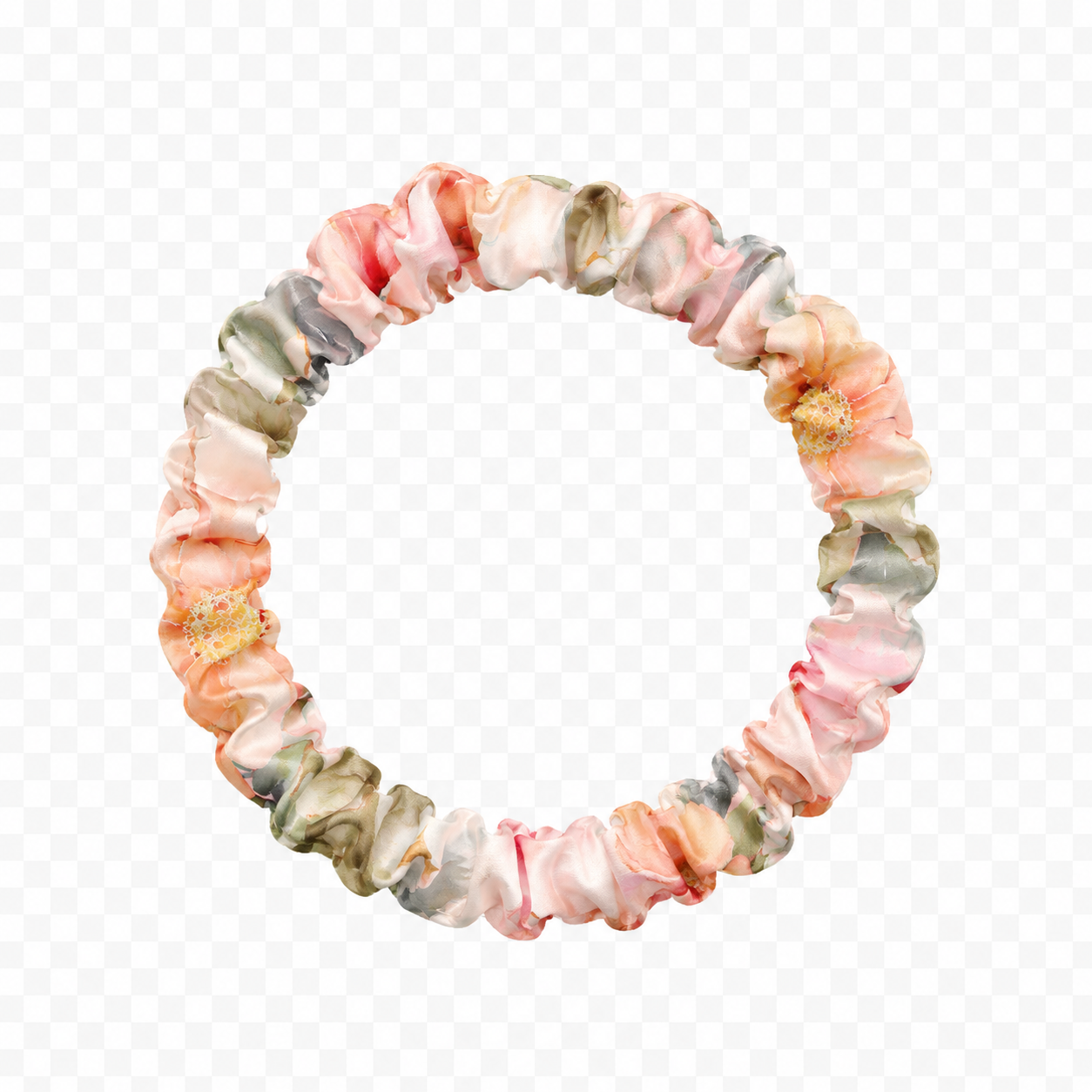 A pastel floral mulberry silk scrunchie made of layered ruffled fabric in soft pink, peach, sage green, and cream, accented with two small gold glitter flower details, shown on a transparent checkerboard background.