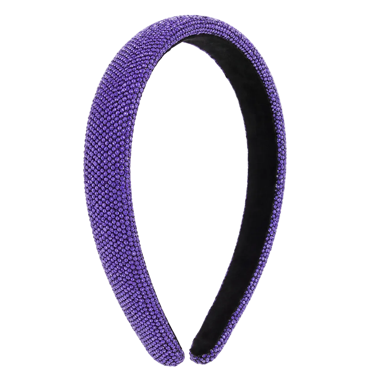 A wide, curved headband embellished with dense purple rhinestones on the exterior and a black fabric lining on the interior, shown against a white and gray checkered transparency background.