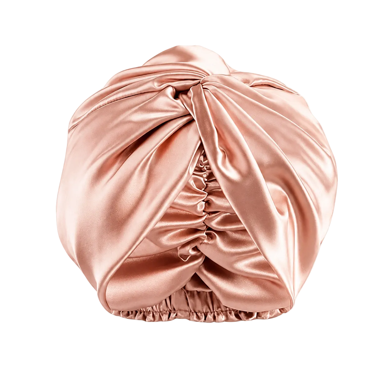A mulberry silk turban-style hair cap in a rose gold color, shown against a white background with a faint checkerboard pattern.