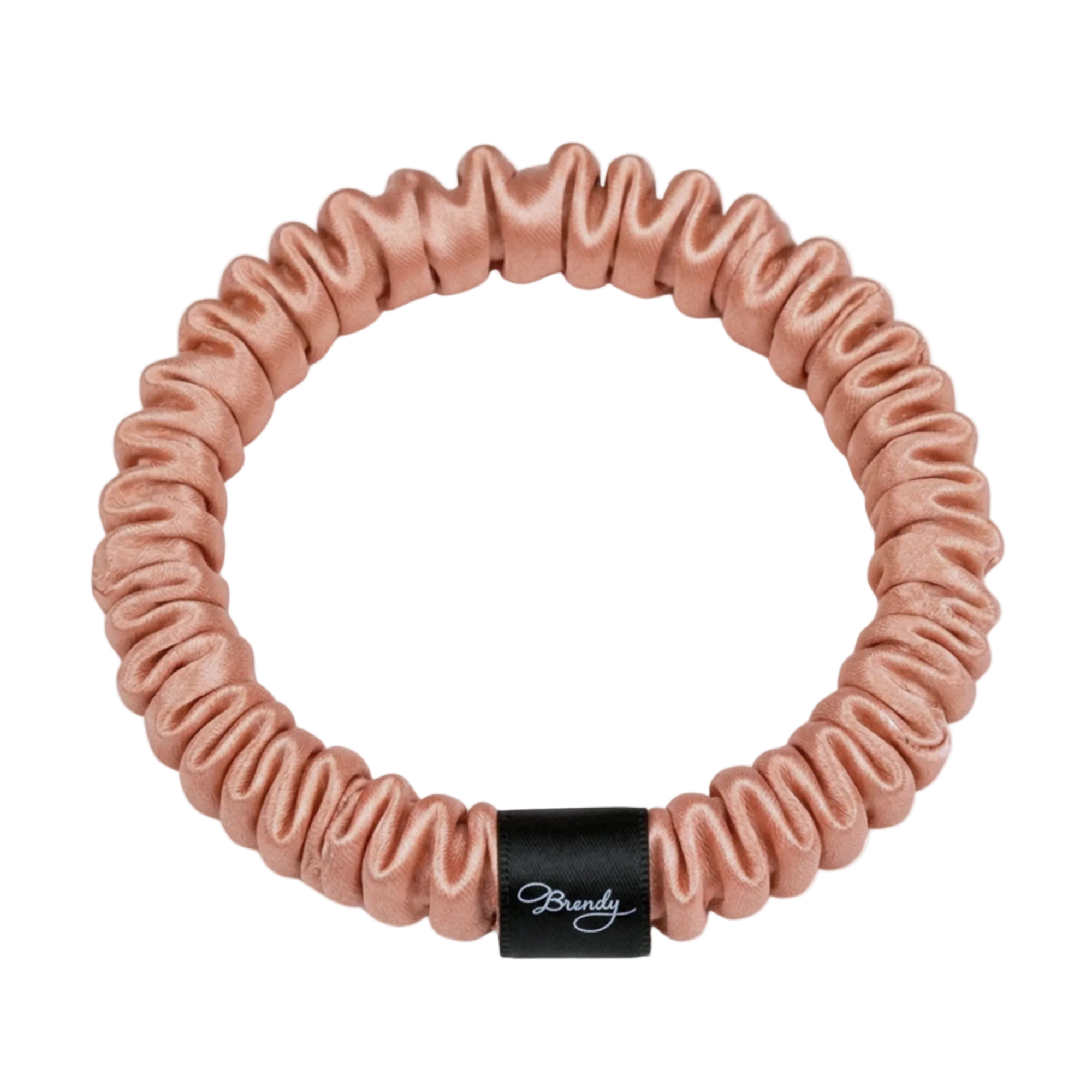 Rose Gold skinny silk scrunchie with a black Brindy Label on a white background