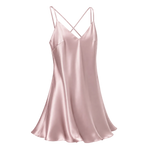 A rose pink mulberry silk slip dress with thin crisscross spaghetti straps and a V-neckline, shown against a transparent checkered background.