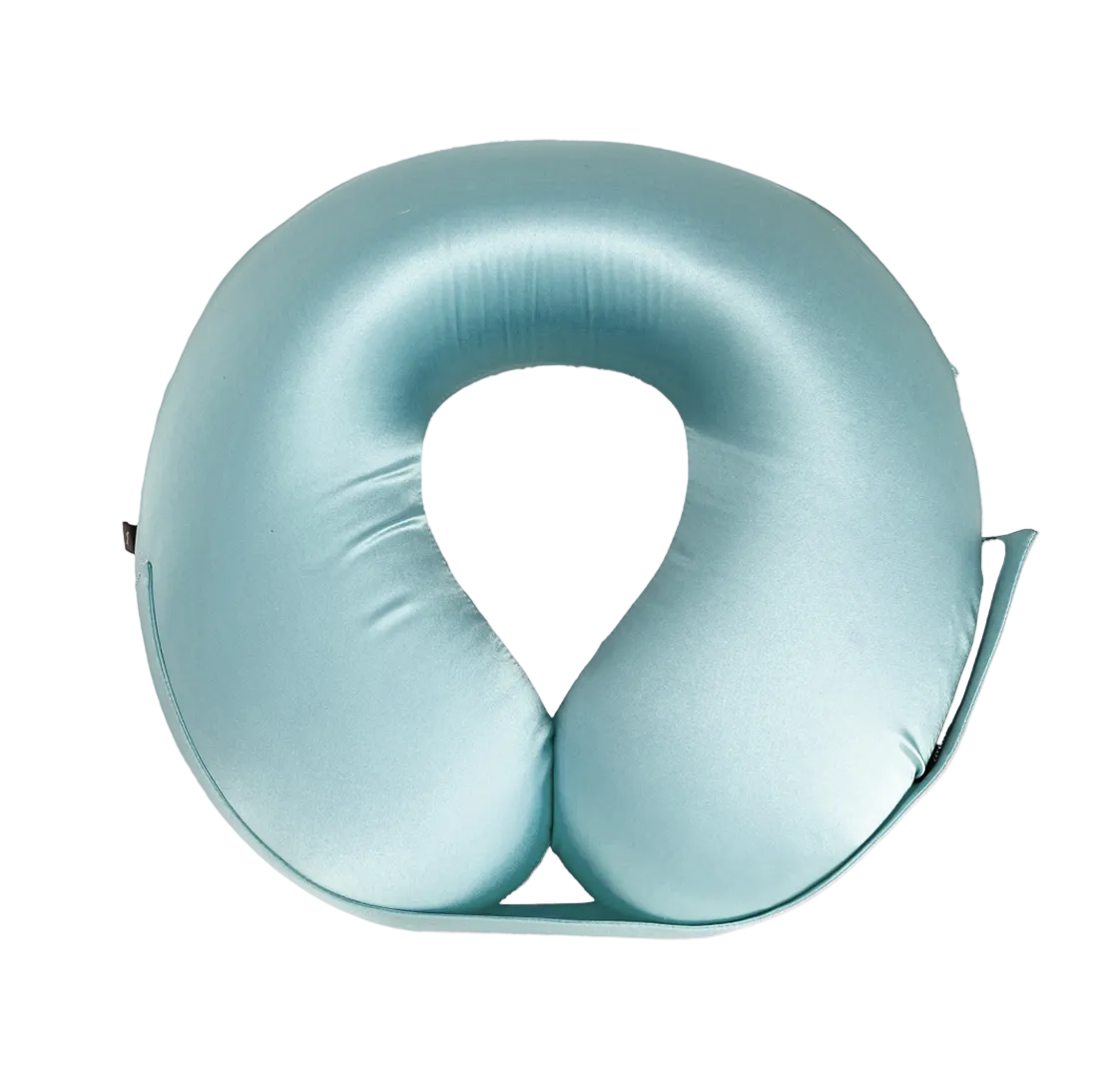 Teal U-Shaped Memory Foam Travel Neck Pillow with Velcro strap on a white background